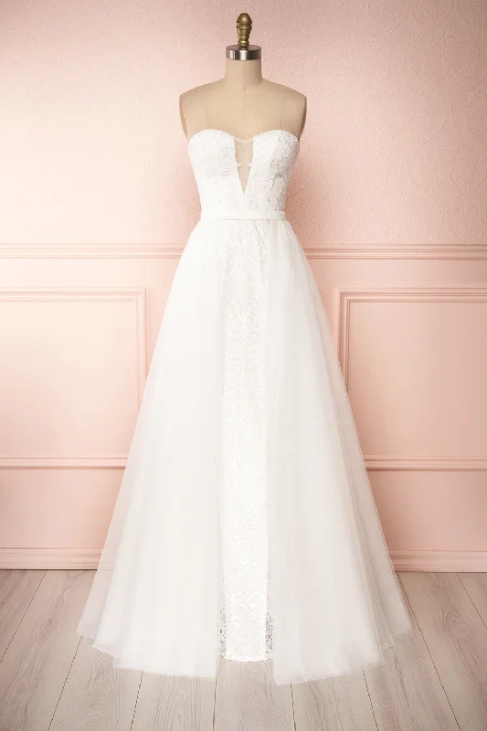 Mini dresses with pom - pom trims for a playful feel Esperance | Wedding Dress