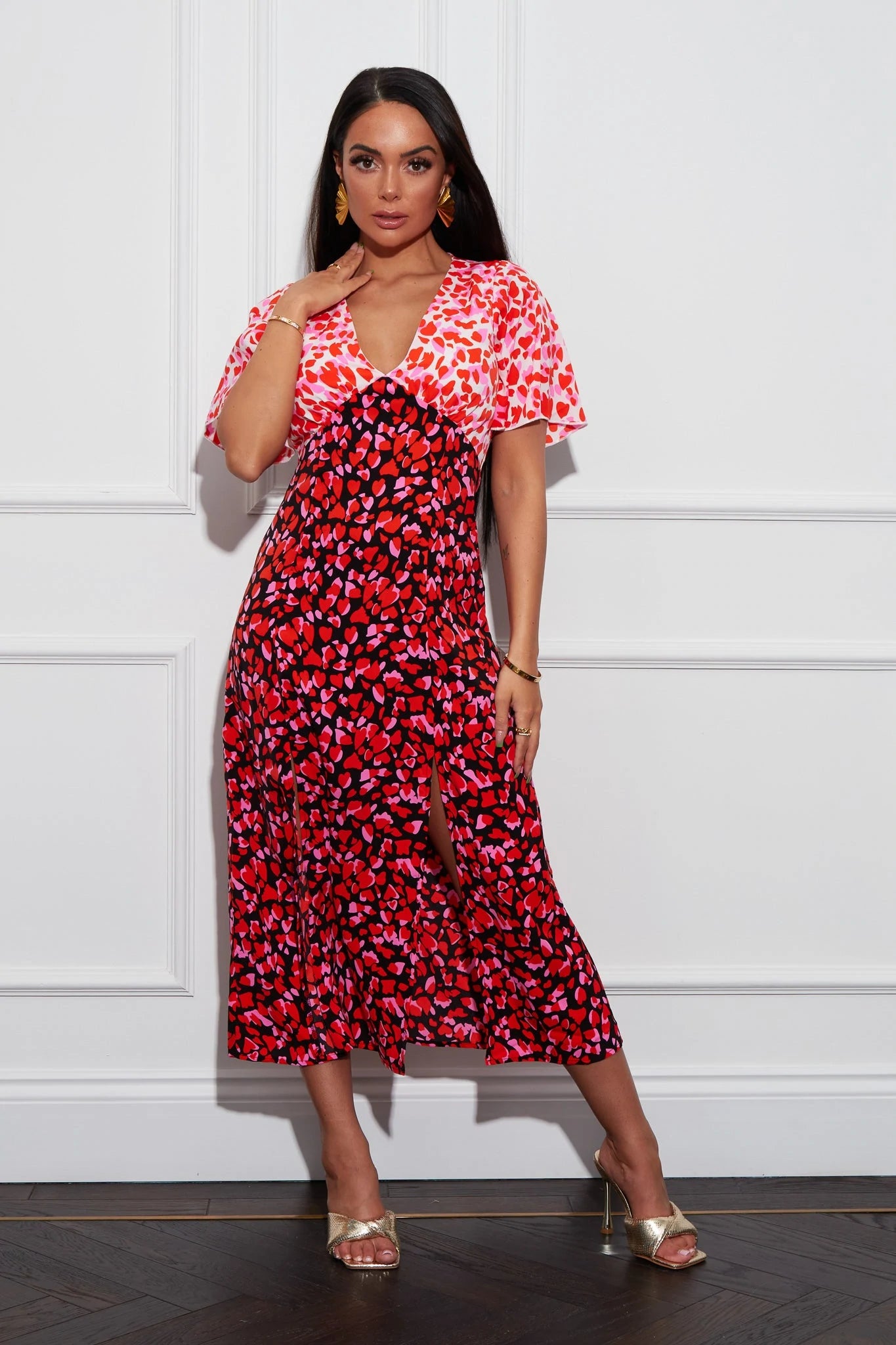 Midi dresses with keyhole backs for a flirty and unexpected detail Anita Multi Heart Print Angel Sleeve Midi Dress Midi dresses with keyhole backs for a flirty and unexpected detail Anita Multi Heart Print Angel Sleeve Midi Dress