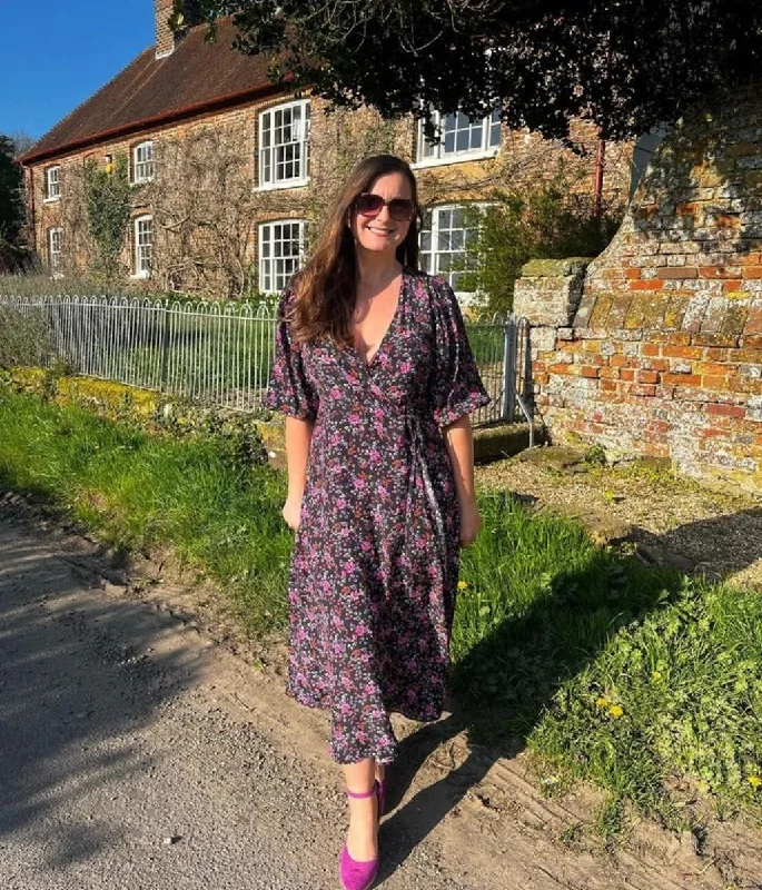 Midi dresses with tassel accents for a bohemian and free - spirited style Floral Wrap Midi Dress Midi dresses with tassel accents for a bohemian and free - spirited style Floral Wrap Midi Dress