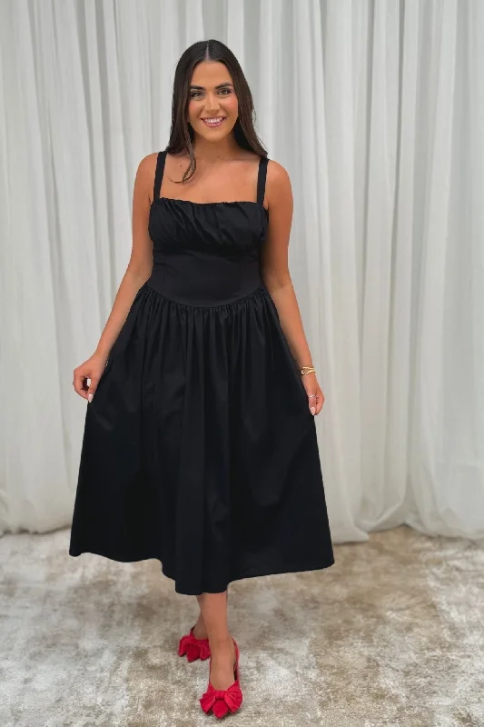 Midi dresses with gathered skirts for a full and flowing silhouette Erica Corset Waist Midi Dress In Black Midi dresses with gathered skirts for a full and flowing silhouette Erica Corset Waist Midi Dress In Black