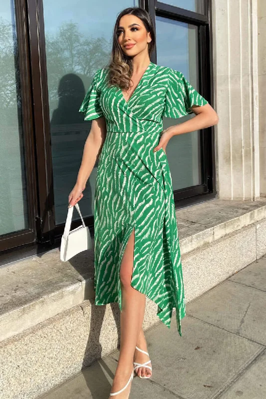 Midi dresses with tiered skirts for a bohemian festival look Gretta Green and White Animal Print Midi Dress Midi dresses with tiered skirts for a bohemian festival look Gretta Green and White Animal Print Midi Dress