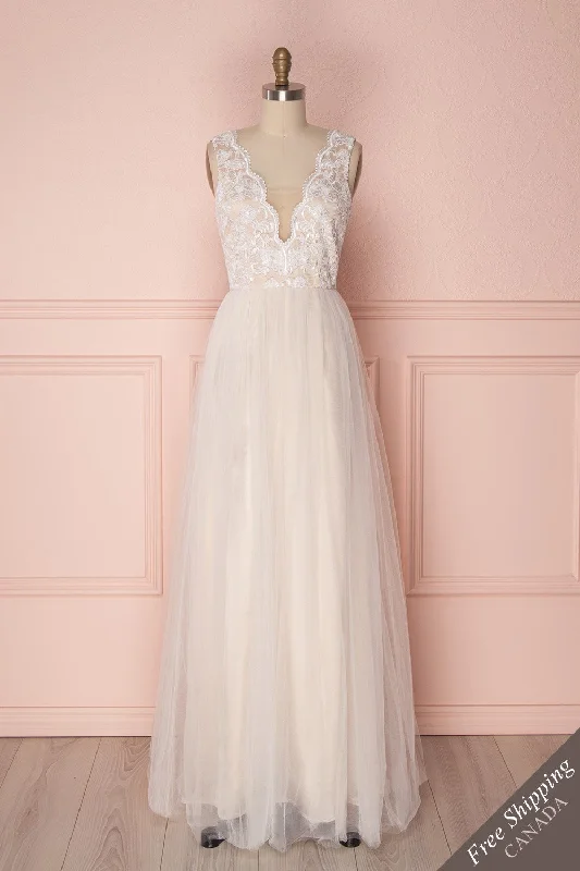 Mini dresses with puff sleeves for a vintage look Braka | Tulle Bridal Dress