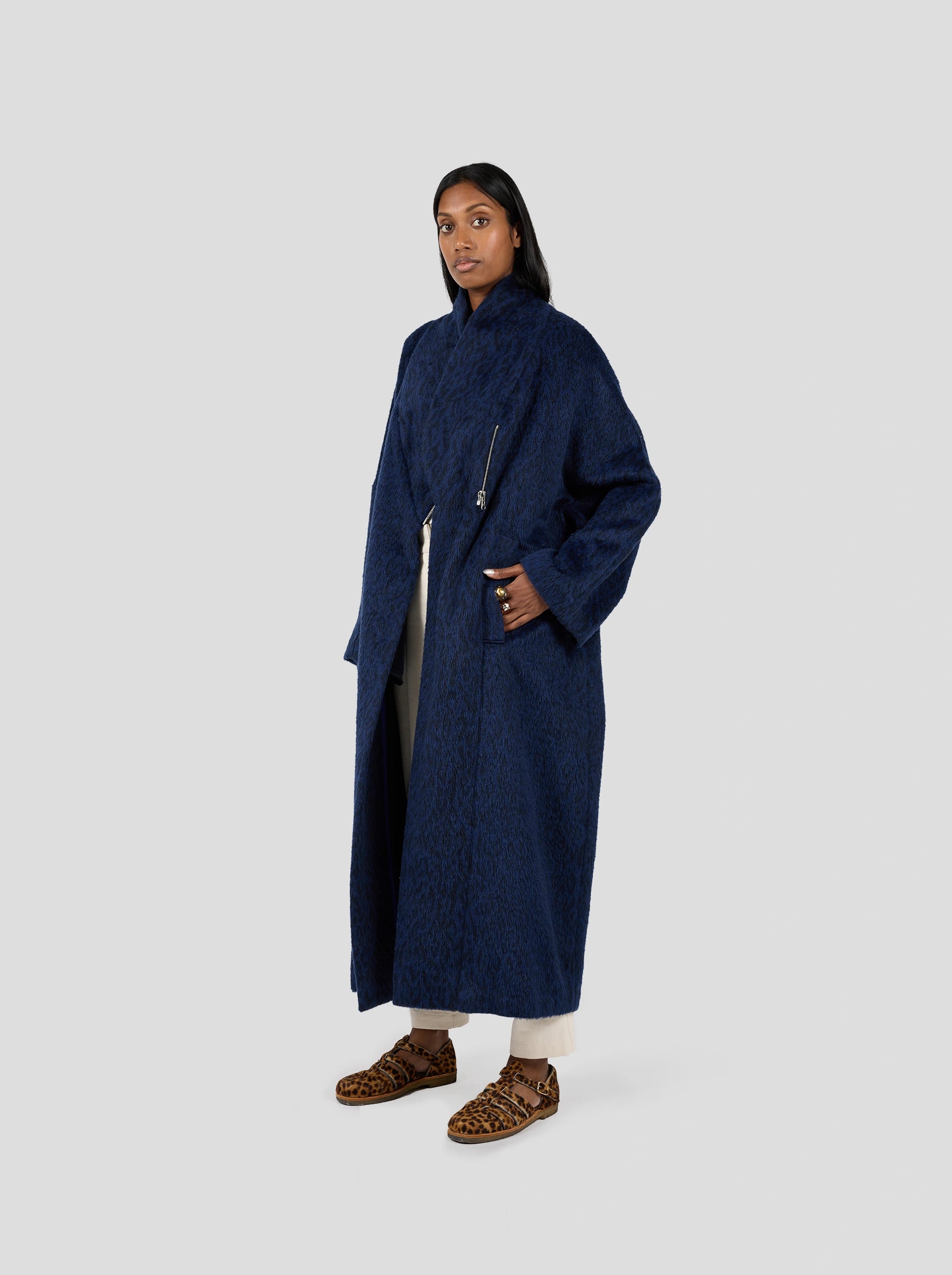 Hooded women's puffer coats in neon colors for high - visibility sportsEren coat in blue woolen Leopard print Hooded women's puffer coats in neon colors for high - visibility sportsEren coat in blue woolen Leopard print