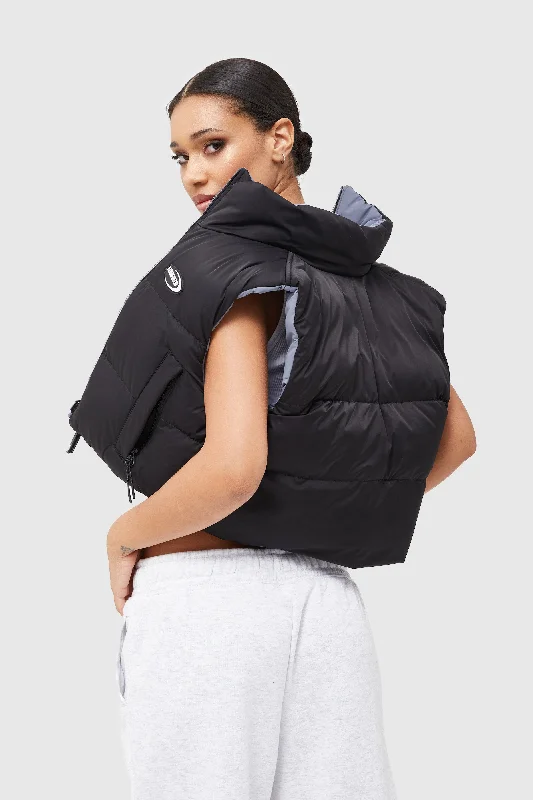 Quilted down women's coats with removable hoods for outdoor activitiesORBIT GILET - REVERSIBLE Quilted down women's coats with removable hoods for outdoor activitiesORBIT GILET - REVERSIBLE