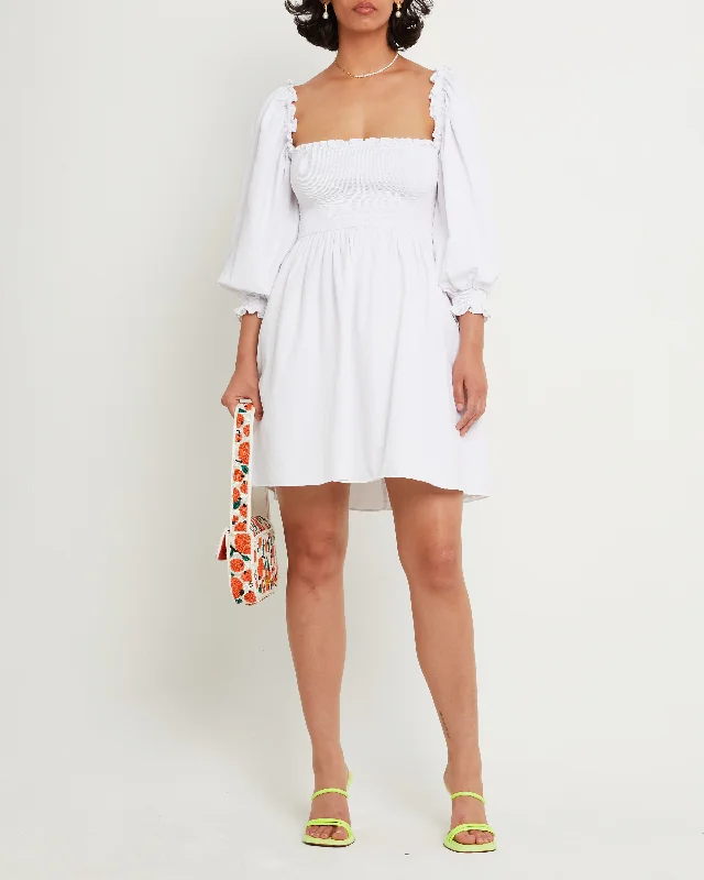 Midi dresses with keyhole backs for a flirty and unexpected detailLaura Mini Dress