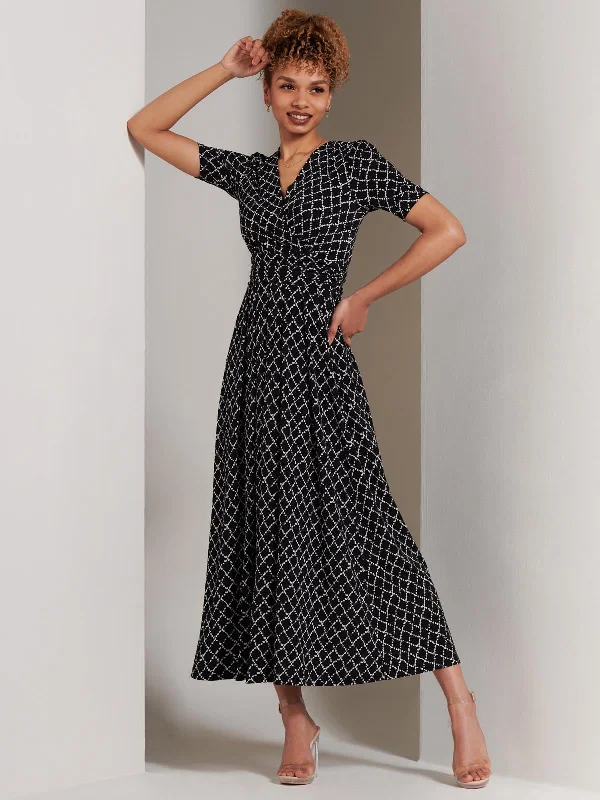 Midi dresses with ruffled sleeves for a more feminine and voluminous lookWrap Front Jersey Maxi Dress, Black Geo Midi dresses with ruffled sleeves for a more feminine and voluminous lookWrap Front Jersey Maxi Dress, Black Geo