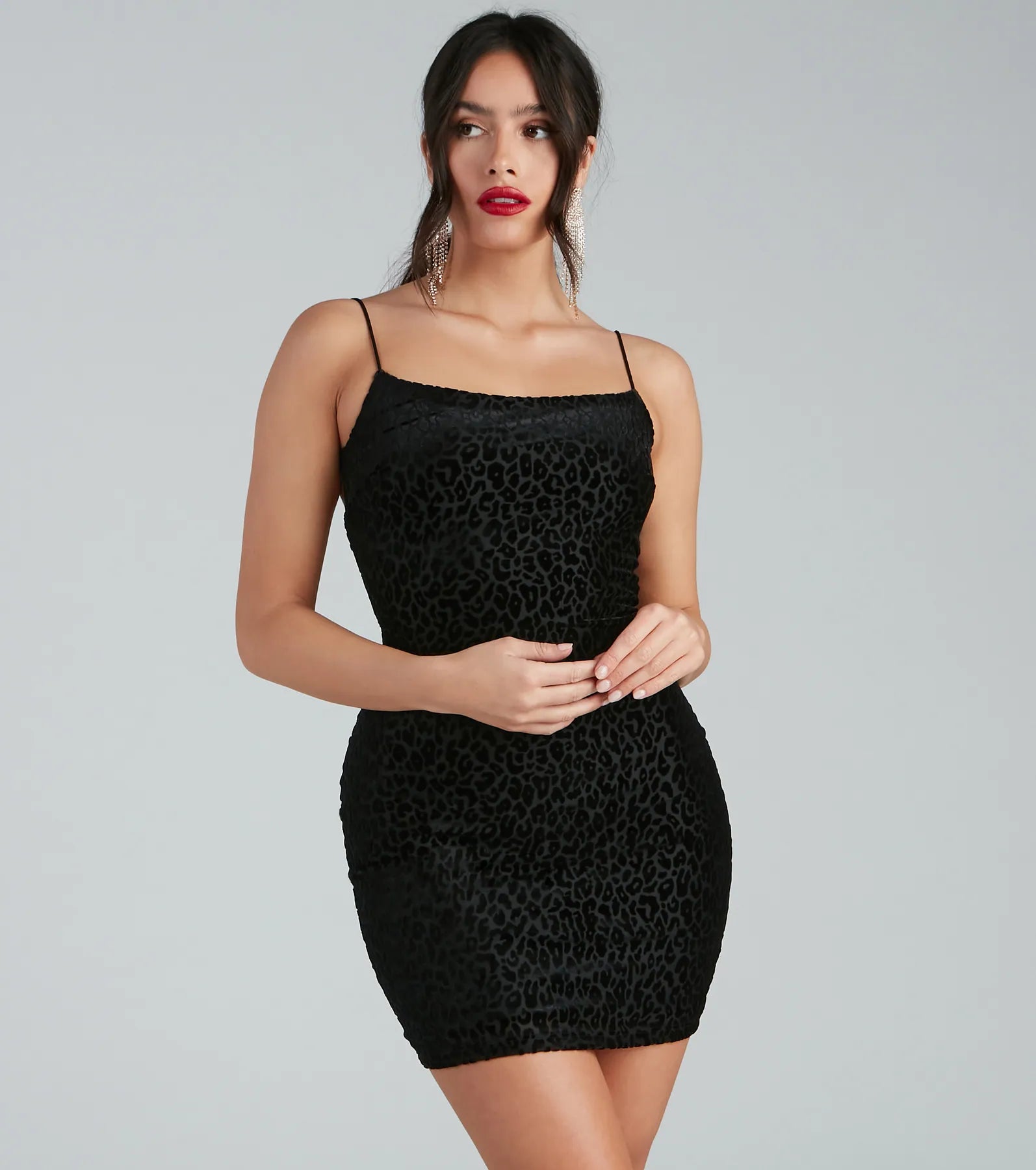 Bodycon dress with a thigh - high slit​Pretty And Purrfect Mini Dress