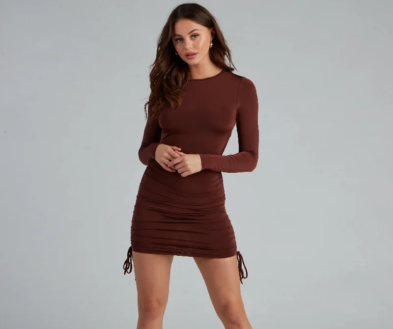 Bodycon dress for a music festival​Ruched Babe Long Sleeve Mini Dress